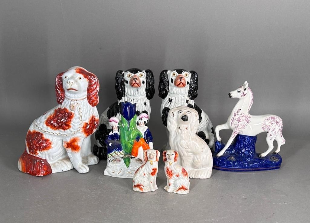 Antique Staffordshire Dogs, Prancing Horse and Spillvase, 19th century: Pair of black and white collared spaniels, 9"H, one red and white collared spaniel, 9.5"H, one white dog with most paint missing, 6.25"H, pair of red and white dog 3.5"H, 8.25"H pr