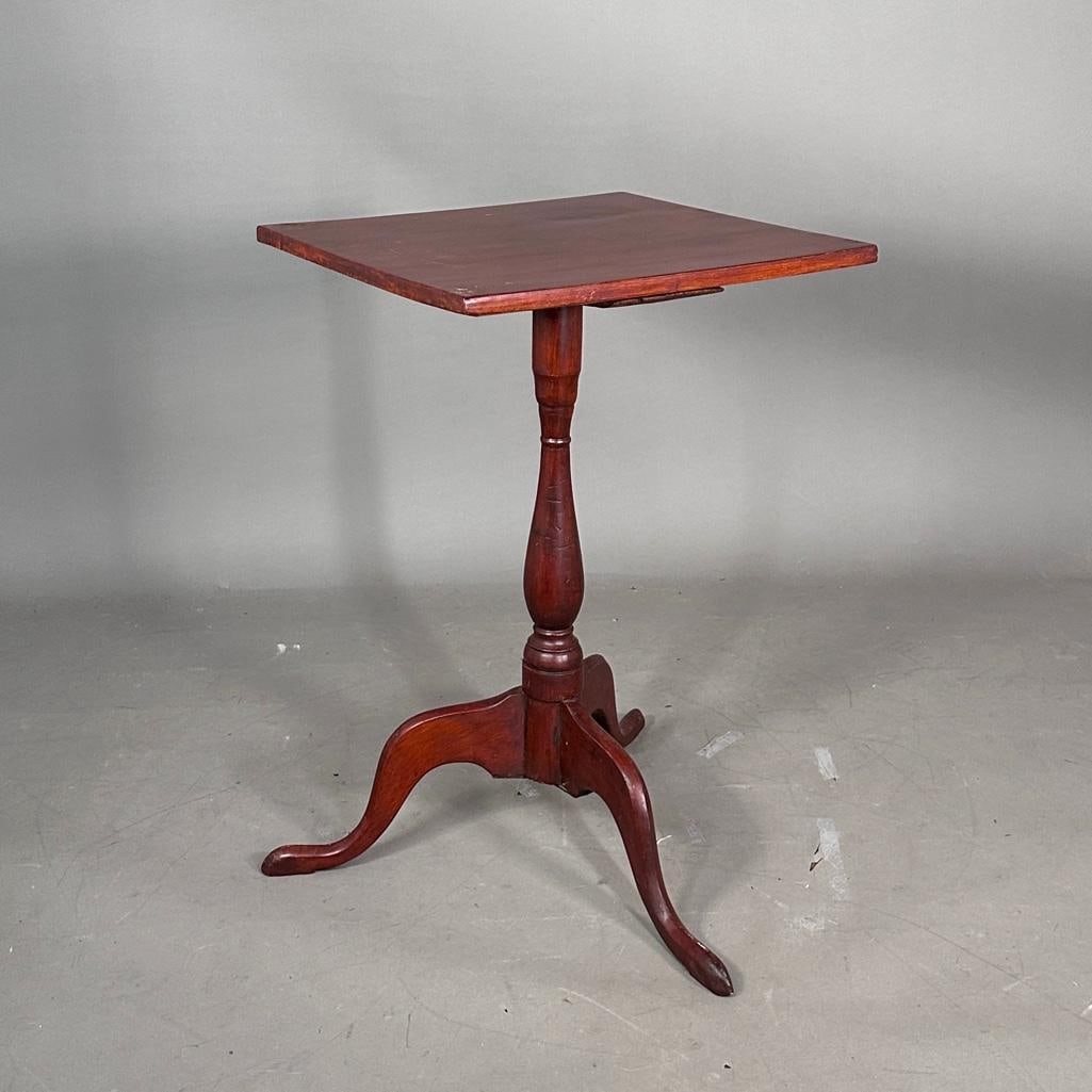 Antique Lamp Table: Single wood lamp or side table on turned pedestal base and tripod duck pad feet, apprx 26.5"H x 17.5"W x 18"D. Condition: light wear from use. Metal bracket reinforcing the tripod base und
