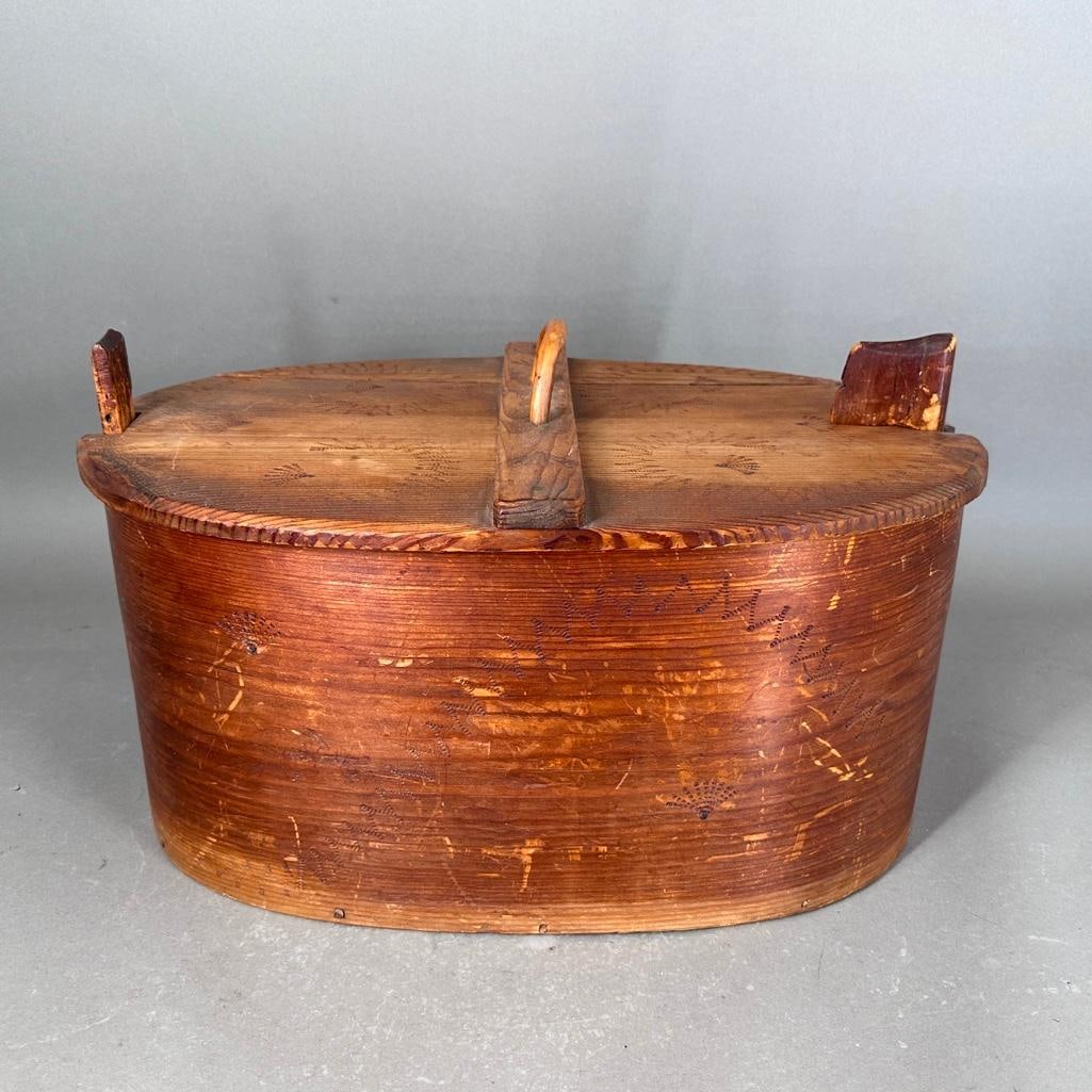 Scandinavian Folk Art Bentwood Box, 19th century.: Pine "Svepask" Norwegian/Swedish box with hand work decorations, removable lid with locking posts and handle; apprx 11"H to top of posts, apprx 9.25"H to lid x 19"L x 13"W. Con