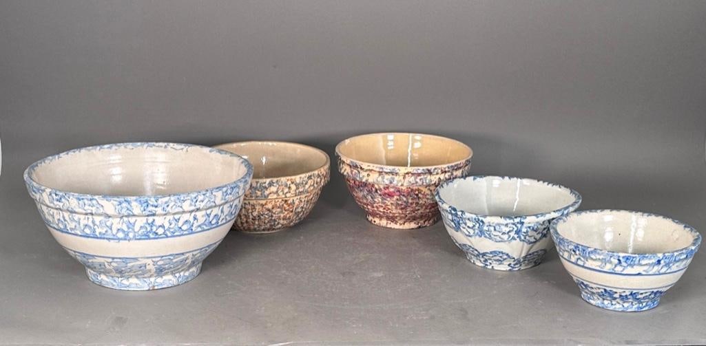 Group of Five Spongeware Decorated Bowls: Lot of five bowls; three blue spongeware and two pink and blue bowls. Medium blue bowl is molded with relief as is one pink and blue bowl. No marks except for a notation on the bottom of the small