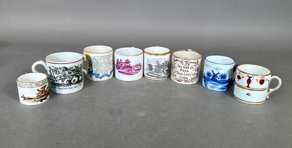 Eight English Coffee Cans, 19th Century: Eight different coffee cans, most with gilt decoration, hand decorated, seven apprx 2.5"H, one is apprx 1.75"H.