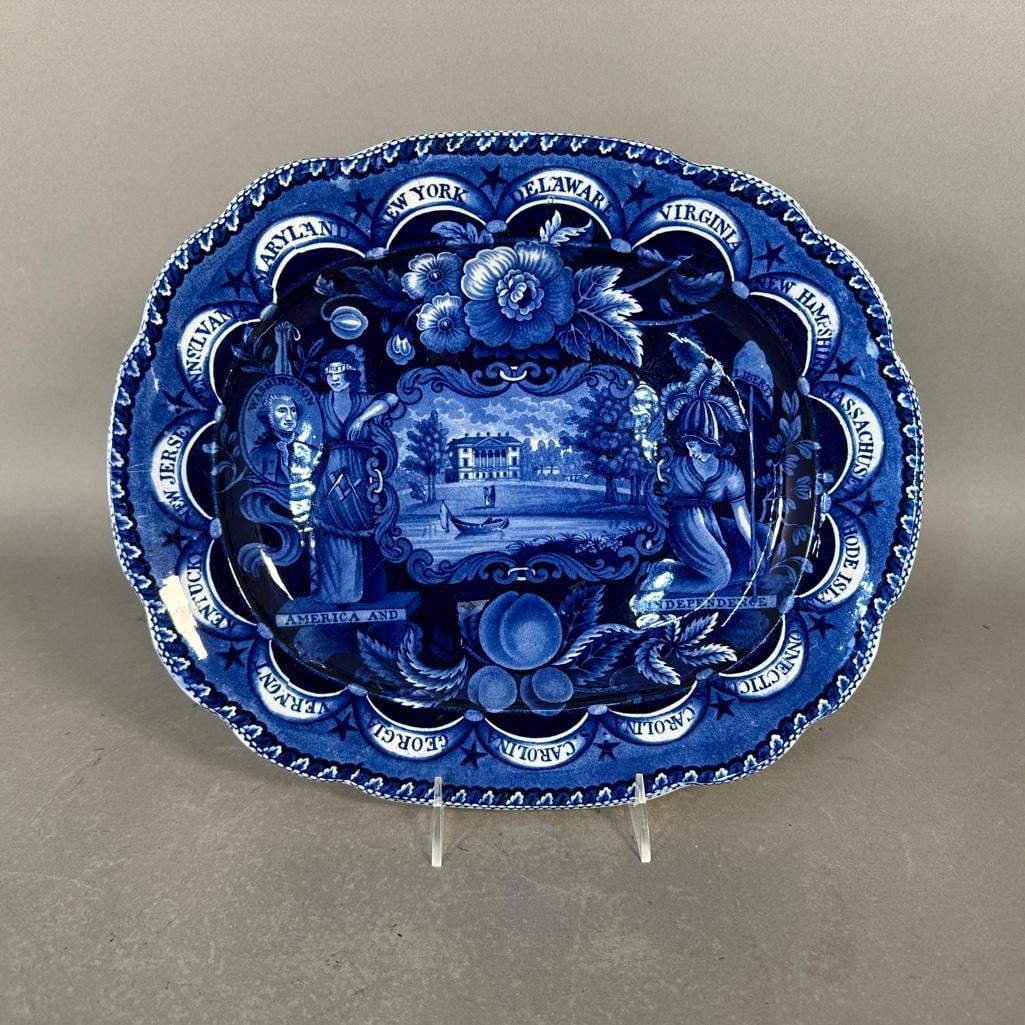Clews "America and Independence" Platter, ca. 1815–1834: Staffordshire cobolt blue transferware, created by James and Ralph Clews (c.1818–1834) for the American market. Known for its patriotic "States" border featuring 15 state names and stars, it