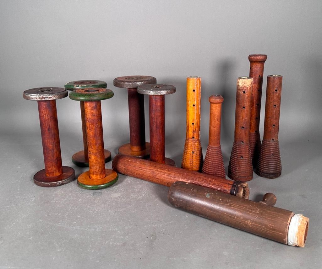 A Group of Antique Wood Textile Spools, 19th Century: Apprx 8.5"H up to 14"T, wood yarn spools, some with metal wrapped ends. Condition: was residue on a few, time toned with wear from age and use.
