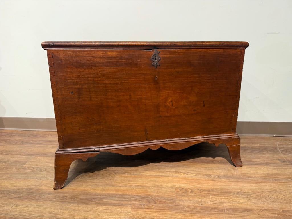 Antique Queen Anne Blanket Chest: Southern pine chest, raised on shaped tall feet with scalloped apron front, hinged lid with 20th century hinges, interior till box, metal escutcheon and lock, upper lock mechanism missing, no key, lar