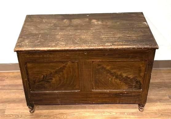 Vinegar Painted American Storage Chest, 19th century: Brown vinegar painted storage chest, hinged lid, interior locking till box with key, deep set paneled on all sides, short turned feet, 28"H x 41"W x 21.5"D. Condition: paint is flaking in 
