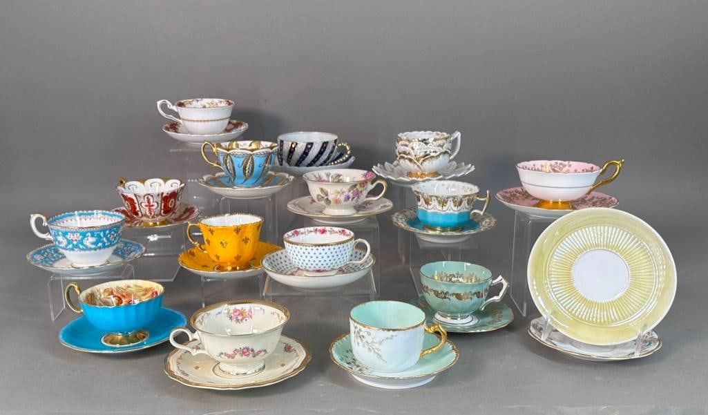 Fifteen Porcelain Tea Cups and Saucers: Mostly Aynsley, however including Coalport, Limoges and other English manufacturers. Each cup and saucer is a gem of strong design and color, some with gilt and all in very nice condition without faul