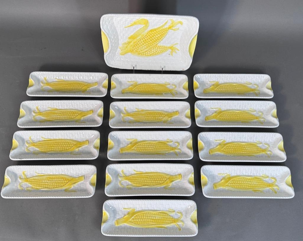 Shafford Ceramic Corn on the Cob Set: Made in Japan, this white and yellow decorated relief ceramic set includes a 2"H x 11"L x 8.5"W corn platter and thirteen individual corn cob plates, each apprx 1"H x 9.5"L x 4,5&#