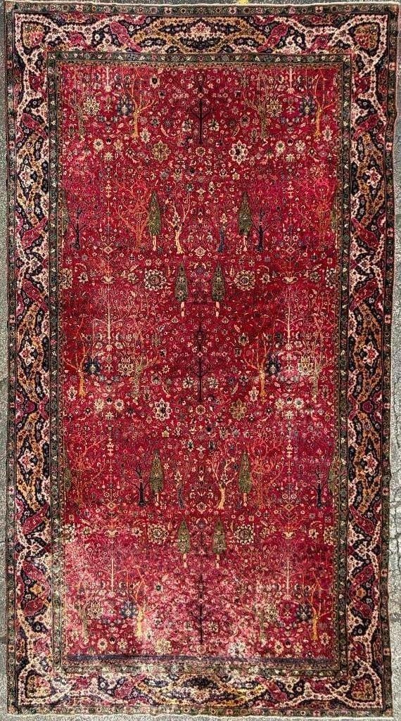 Antique Turkish Sparta Carpet 24'8" x 12'9": Ca. 1900. Fine wool on cotton weft, directional pictorial garden design with cypress trees, willows and shrubbery on a deep red field. Intaglio border with a layered Shah Abbasi palmette and vine scro
