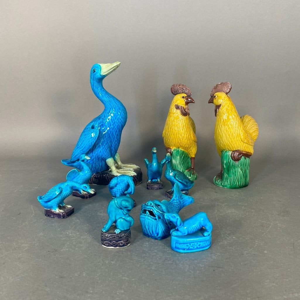 Chinese Export Porcelain Figures: Pair of 8"H yellow roosters, 9.75"H turquoise duck, five miniature geese apprx 2.25"H and 3"H, two have been repaired, two dogs and a fish, apprx 2.5"H. Most marked China, or Japan. Condition: the lar