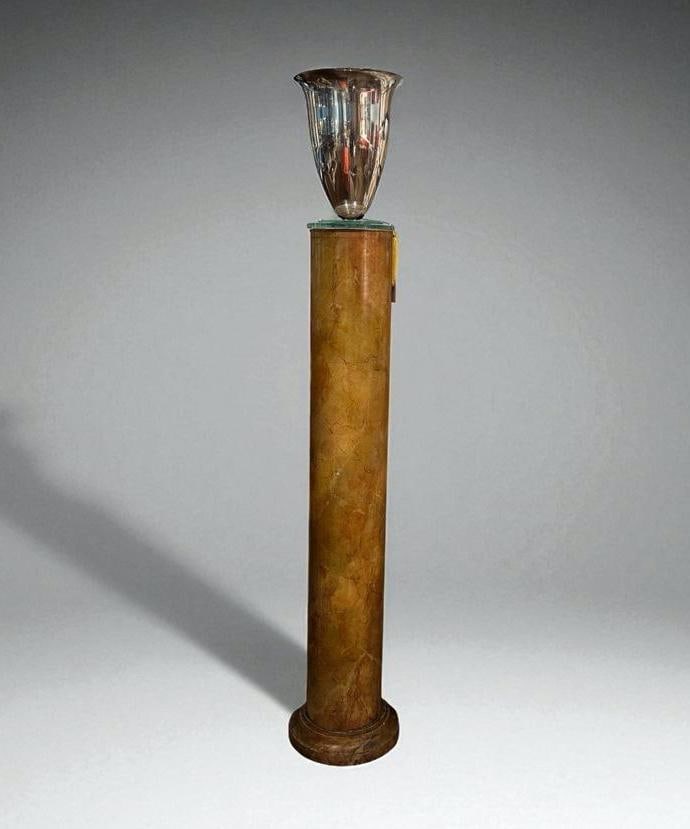 In the Style of Dorothy Draper, Faux Marble and Silver Plated Torchere Lamp: In the Style of Dorothy Draper (American 1889-1969), Faux Marble and Silver Plated Torchere Lamp, simple column form in faux marbre finish, the column topped with two clear glass discs surmounted by a