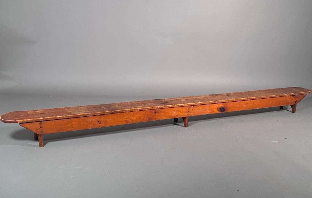 Antique Pine Kneeling Bench: Constructed of pine, three U shaped feet and top plank with curved ends; apprx 6"H x 7'L x 6"w. Family size. Condition: surface wear