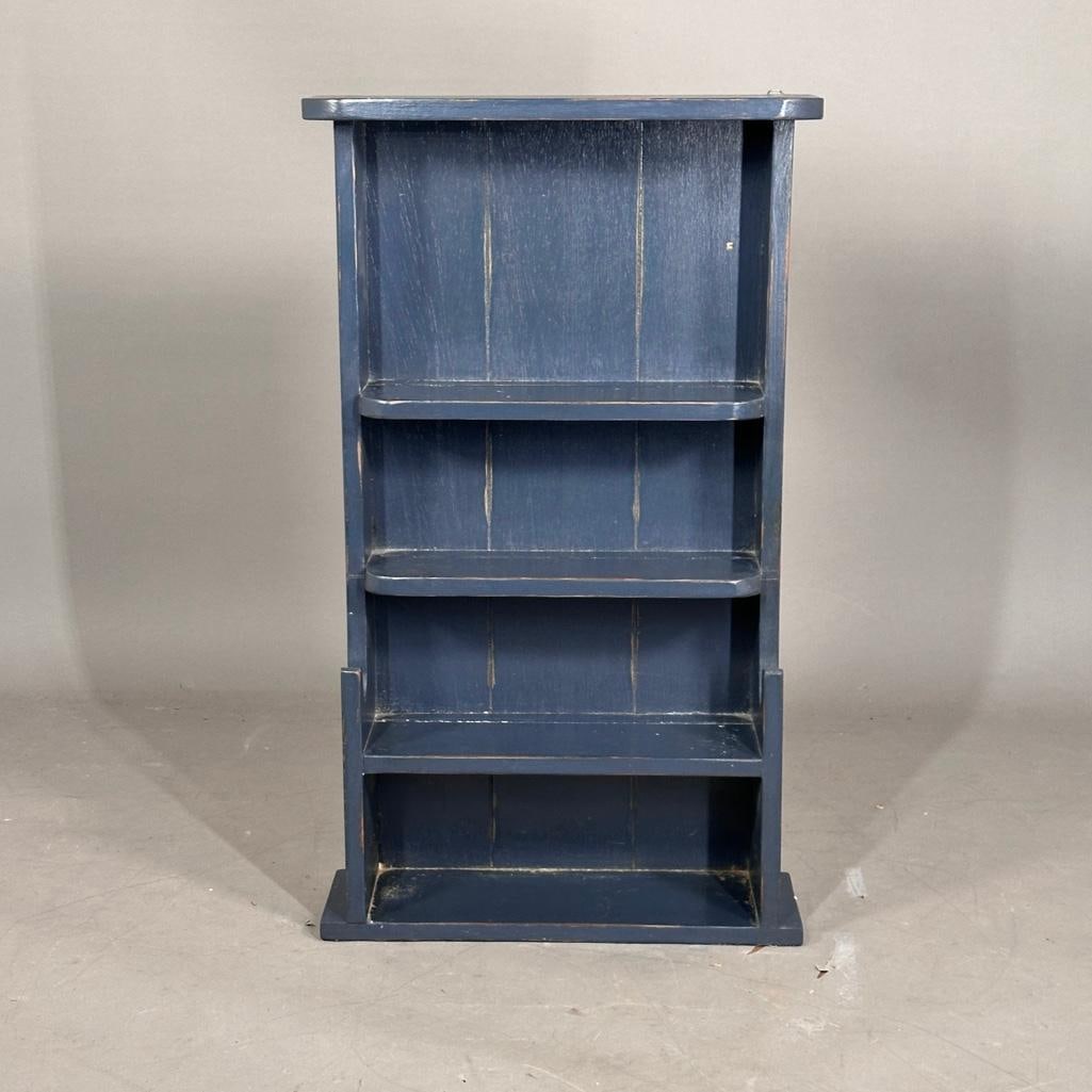 Miniature Stepback Display Cabinet: Modern, child's size stepback cabinet for display, painted blue, with four shelves, apprx 31.5"H x 18.5"W x 5.5"D. Condition: modern, wear to to paint at edges, good.