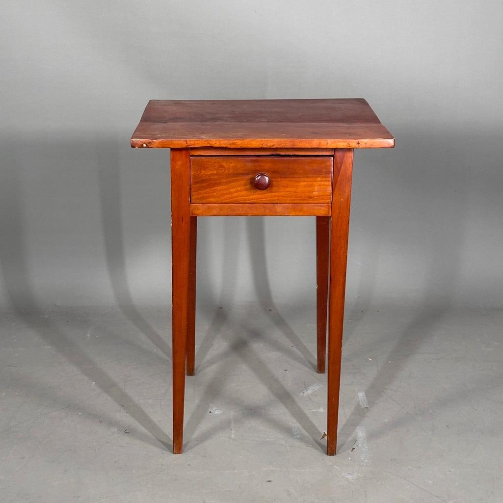 Antique Cherry Work Stand: Having one drawer, tapered legs, wood knob pull, apprx 28"H x 20"W x 17.75"D. Condition: Wear from use, as pictured. Restored.