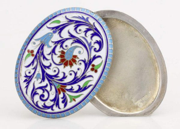 A Russian Silver and Enamel Picture Holder , Grach: A Russian Silver and Enamel Picture Holder, Grachev, St.Petersburg, Circa 1890. Cyrillic Maker's mark "Grachev", 88 standard. Size: 7 X 5.5 cm.