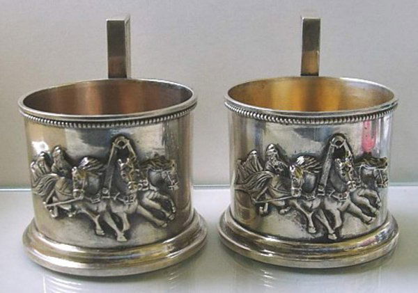 Pair of Russian Solid Silver Tea Glass Holders: Pair of Russian Solid Silver Tea Glass Holders. With spurious maker's mark: One tea lass holder marked "GK" in Latin for Gustav Klingert, dated 1892, 84 silver standard, another marked Faberge with im