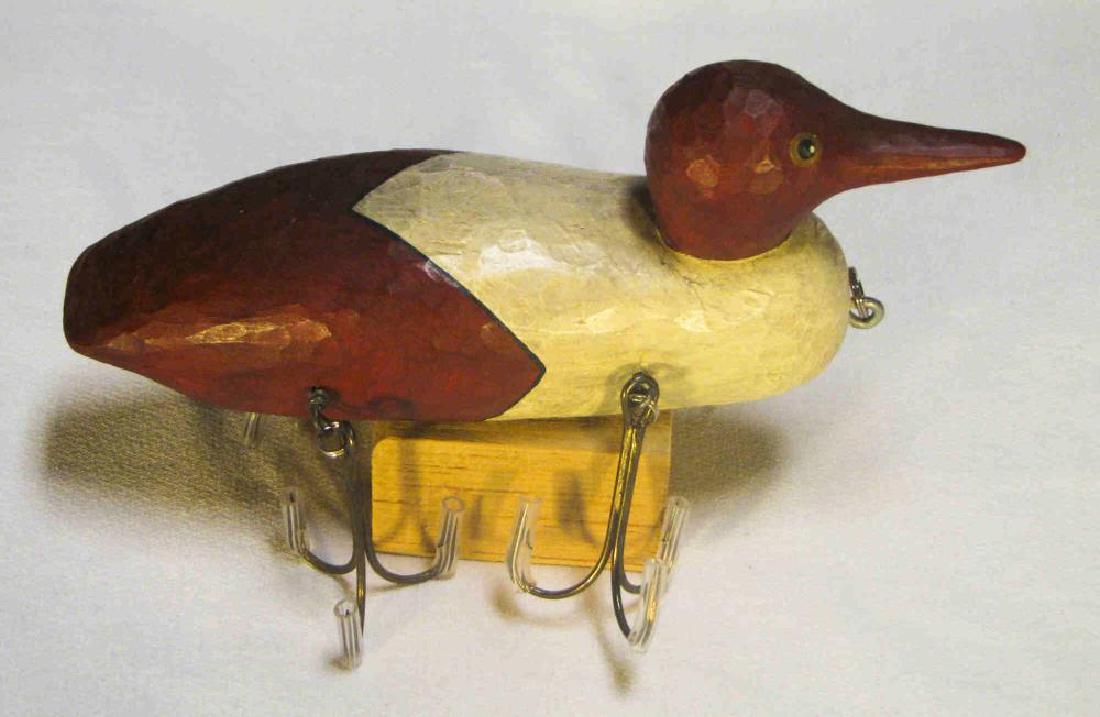2004 Steve Robbins Musky Duck Ice Fishing Decoy #1: Steve Robbins Musky Duck Ice Fishing Decoy from 2004. #1 in series. From The Fish Decoy Company of Clifton, Ohio. Measures approximately 8". [KVA 24]