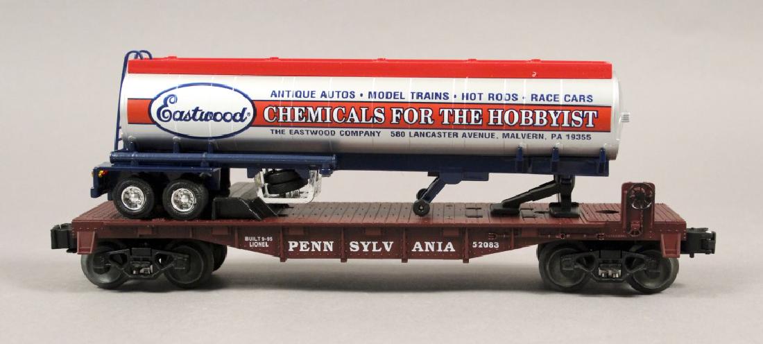 Lionel 6-52083 Eastwood Chemicals Tanker w/ Car: With Pennsylvania Flatcar. This flatcar features a removable tanker trailer, die-cast metal sprung trucks, die-cast metal operating knuckle couplers, metal wheels and axles. Includes original box. - -