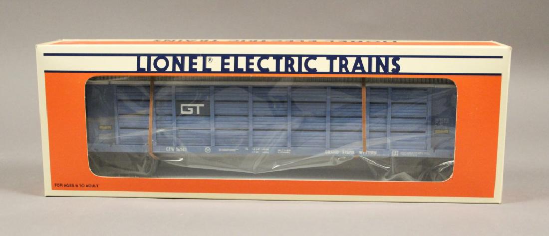 Lionel 6-16242 Grand Trunk Western Auto Carrier: O-gauge, Operates on O-31 or greater curves, Metal wheels & Axles, Operating Couplers, Double opening doors on both ends, Perfect for Matchbox or Hot Wheels cars. - - - - Join our mailing list at http