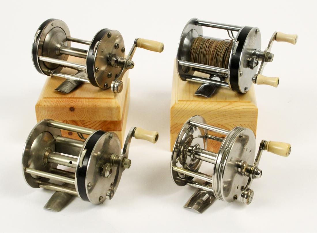 4 Collectible Shakespeare Fishing Reels: Shakespeare Ideal level winding No. 1963, Wm Shakespeare JR. Service Reel # 3, Shakespeare model 1922, Model 26. [JHI 448]