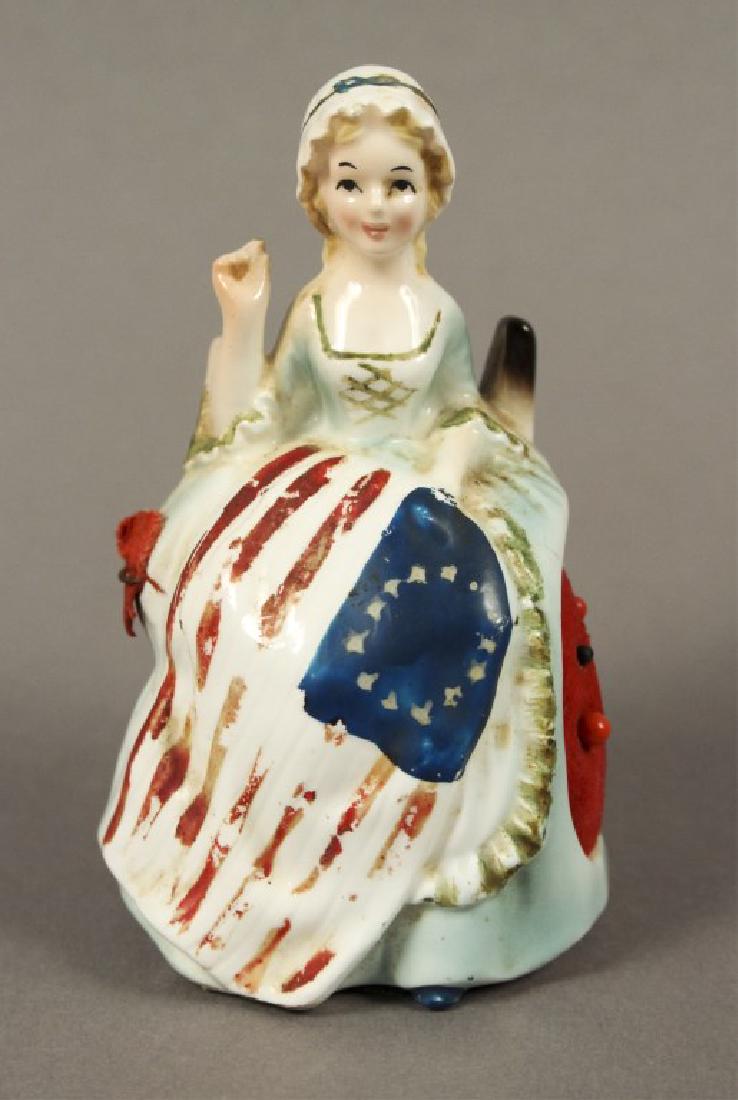 Antique Betsy Ross Pin Cushion Figurine: Enesco pin cushion with measuring tape on the side of her skirt. [SCG 672]