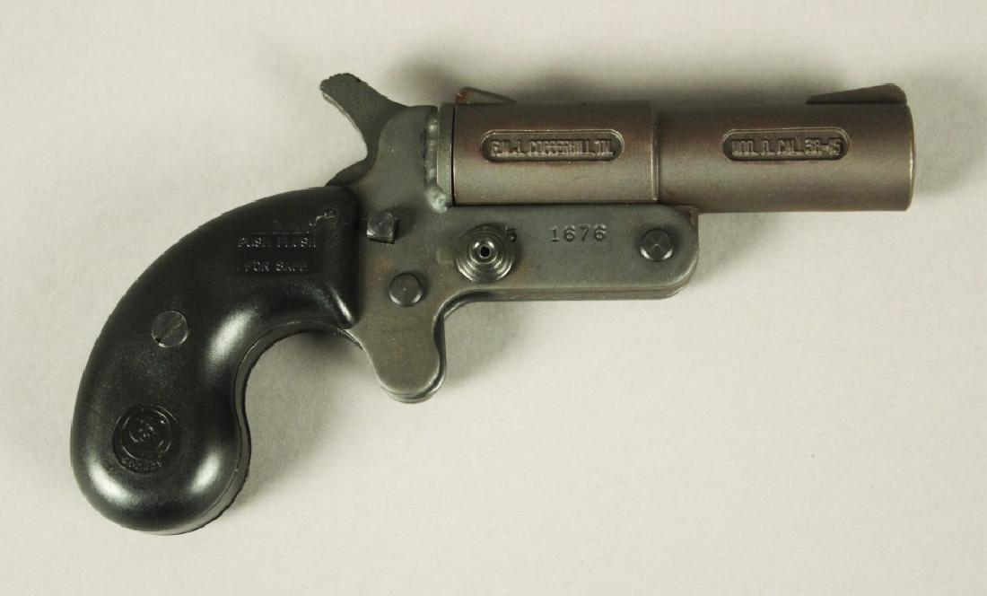 Derringer F.M.J. 410 Pistol Model D 1676: .38 - .45 Copperhill, TN. Serial # 451676. [ILY 310]