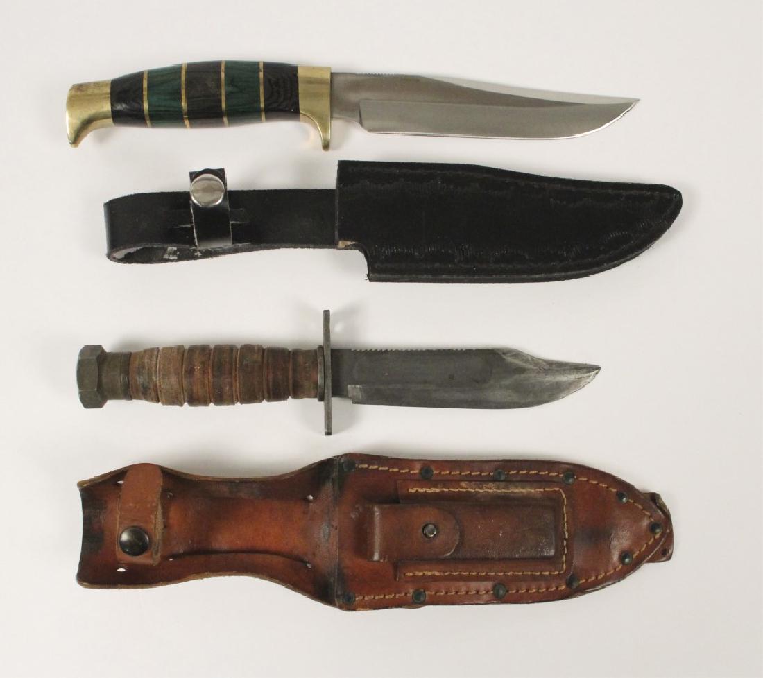 2 Buck Knives with Sheathes: See a great selection of knives and swords in the last section of the auction. [ILY 370]