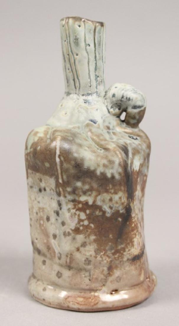 Plum Tree Pottery Vase - Stamped J. Glick: Plum Tree Pottery Vase - J. Glick. Measures approximately 2 1/2" x 5 1/2". Located in Farmington Hills, Michigan, USA, Plum Tree Pottery (closed as of summer 2016) has been a private studio space sinc