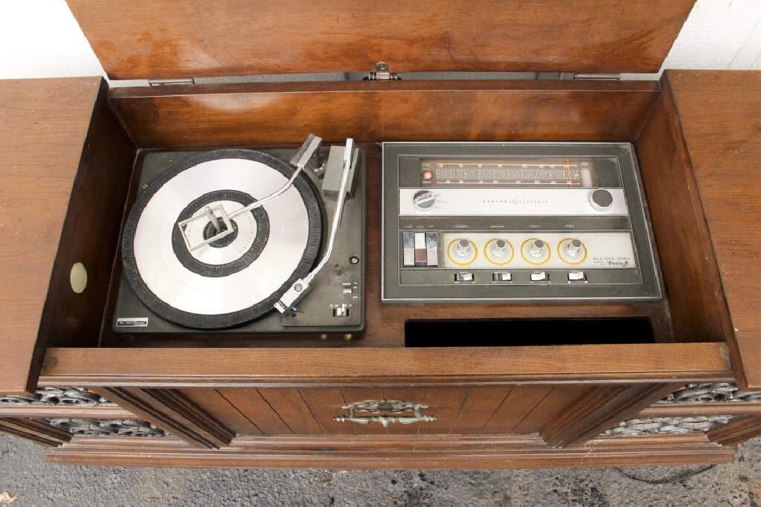 GE Record Player - Radio Buffet Cabinet: Radio works, record player works after you adjust and play with the settings. Works! Vinyl Records. Jack White. Jack Benny. Bob Hope. [DAB 107]