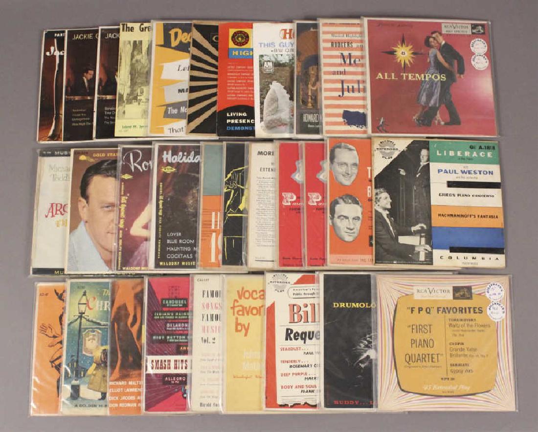 31 Vinyl Records - Liberace - Gleason - Martin: Listen to greats like Liberace, Dean Martin, All Tempos, Jackie Gleason and many more. May contain scratches or other blemishes. [BRW 811]