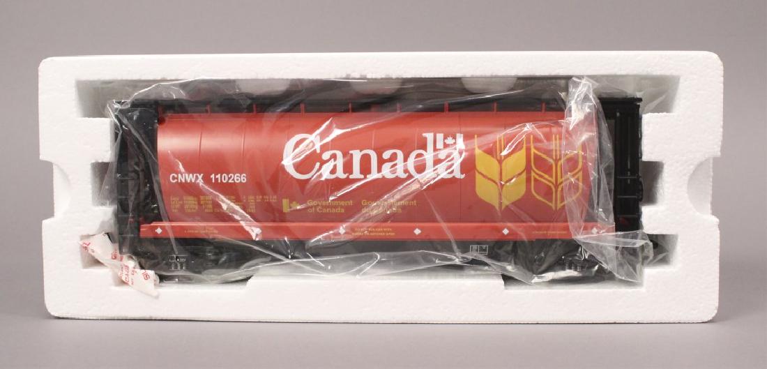 MTH 20-97418 Canada 3 - Bay Cylindrical Hopper Car: This product is compatible with all O Gauge 3-Rail track systems. [WNM M-H 20-97418]