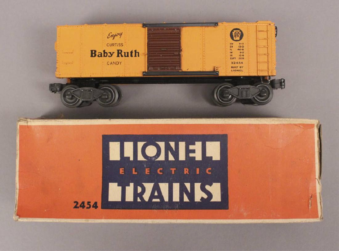 Lionel 2454 Orange Baby Ruth Box Car: Standard features of box car include: painted orange car, black lettering, painted brown metal doors, metal corner steps on the frame, metal doors, staple-end trucks plus a brake wheel. Early 1946 pro
