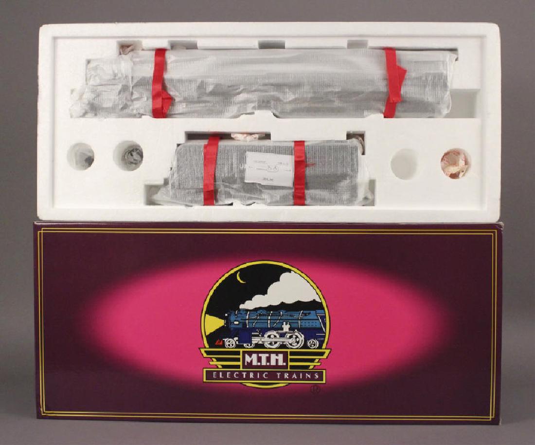 MTH MT-3021LP U. P. 4-8-8-4 Big Boy Steam Engine: Cab No. 4012 Features: Constant Voltage Headlight, Detailed Cab Interior w/Figure, Lighted Marker Lamps, Fire Box Glow, Pittman Motor w/Flywheel, 2 Cab Numbers, Proto Sound-Coupler-Smoke. No, we're no