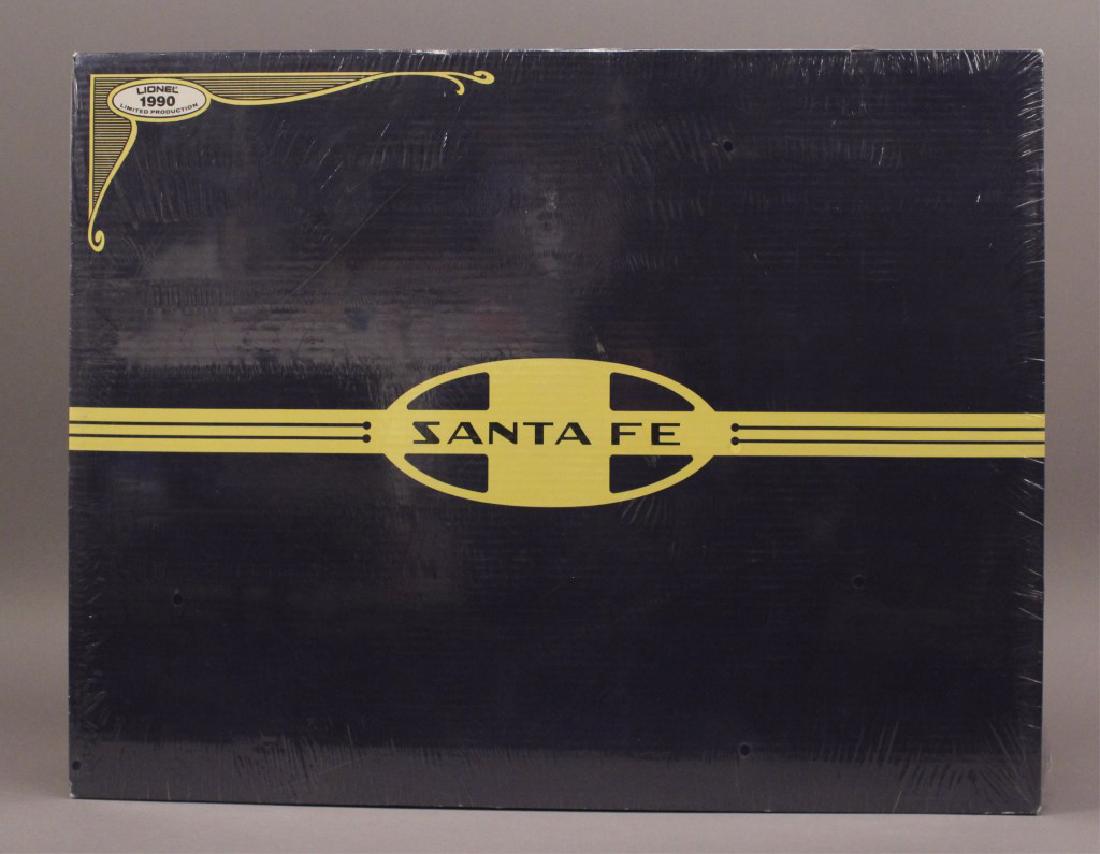 Lionel 6-11713 Santa Fe Dash 8 Freight Train Set: This set was the top-of-the-line set from 1990. The locomotive features dual can motors, die cast trucks, magne-traction, flashing light on the cab roof, operating headlamp, illuminated cab and number