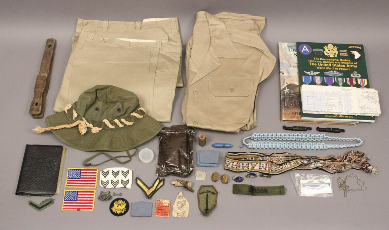 Large Assorted Military Items - Maps - Patches: Patches, Military issue trousers 22 x 31, shirts, army green explorer hat, map of "HAI LANG" Vietnam, Vietnam toe popper bobby trap. Please view photos for descriptions. Army. Navy. Air Force. Marines