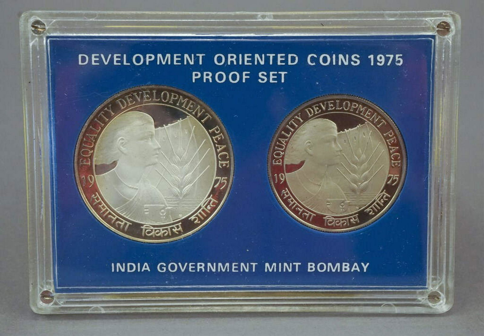 1975 India Development Oriented Proof Set: The mark "B" on the coin indicates that these are Proof Coins struck at the Bombay Mint. The 50 Rupee and 10 Rupee coins are Development Oriented Coins which were released on 15-8-1975. [KRE 257]
