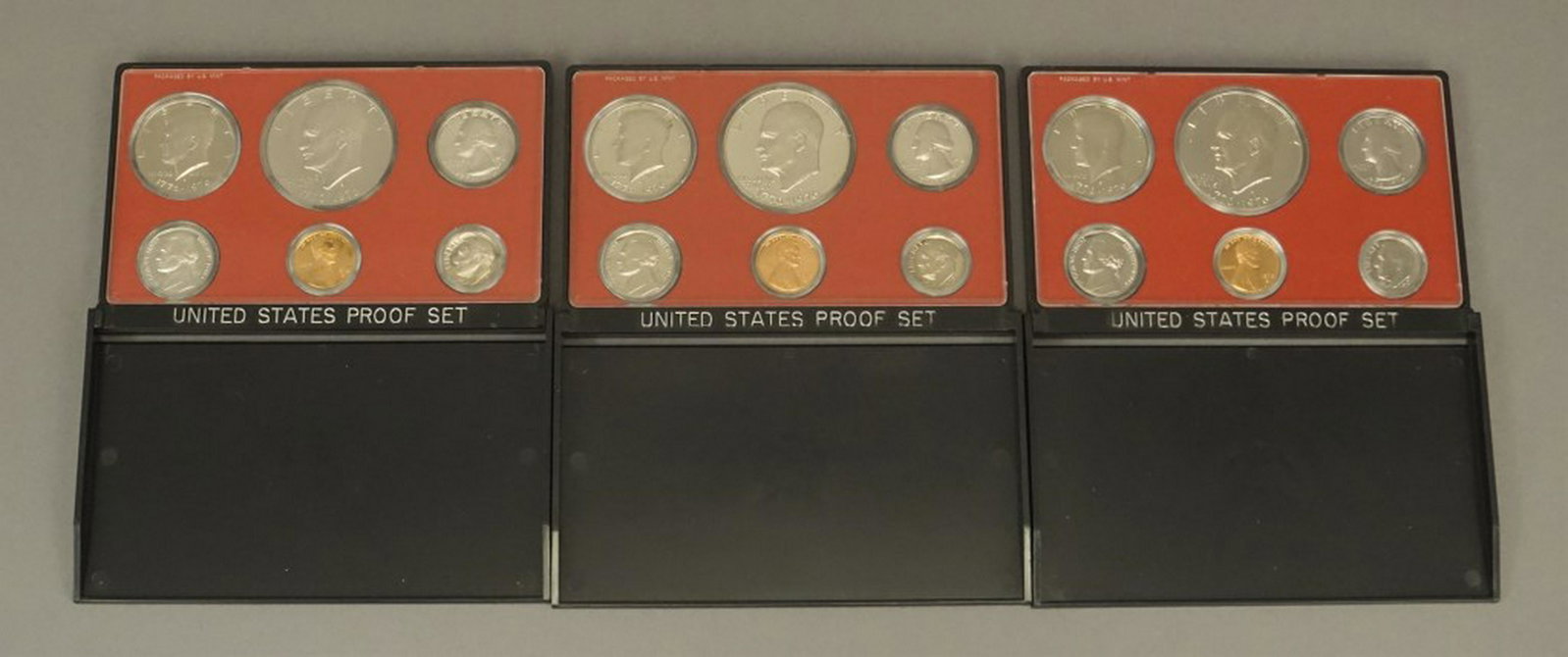 3 - 1976 US Bicentennial Coin Proof Sets: One example each of the Lincoln Cent, Jefferson Nickel, Roosevelt Dime, Bicentennial Washington Quarter (Copper-Nickel Clad), Bicentennial Kennedy Half Dollar (Copper-Nickel Clad), and Bicentennial Ei