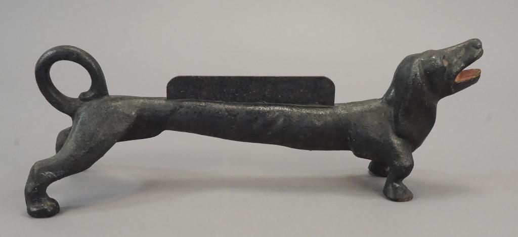 Bow Wow! Cast Iron Dachshund Boot Scraper - 26 lb.: The dachshund is also known as the wiener dog, a short-legged, long-bodied, hound-type dog breed. They may be smooth-haired, wire-haired, or long-haired. The standard-size dachshund was developed to s
