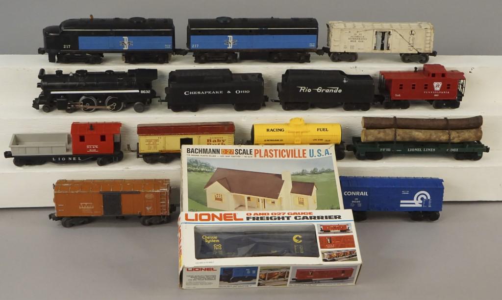 Assorted Lionel Collectible Train Cars: Lionel 217, Chesapeke and Ohio 8632, Conrail 9035, Lionel 0 + 027 freight center, Bachmann Plasticville, Lionel Lines 1679-6361. [ARN 150]