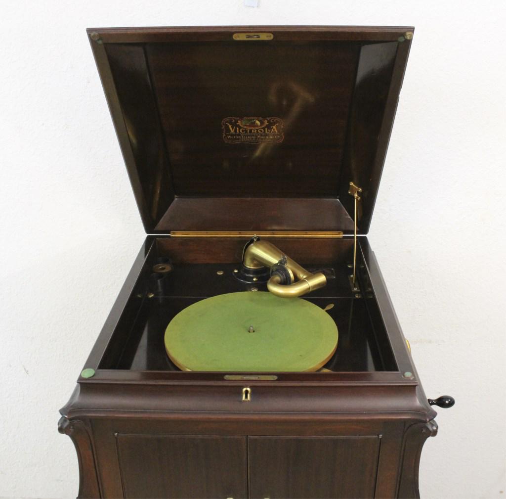 Vintage Victrola by Victor Talking Machine Company: Vintage RCA Victor VV-III 2342 console Victrola record player. Made in Camden, USA. Victrola include several records including "I Hear You Calling Me by John McCormack & many more. It makes sound but