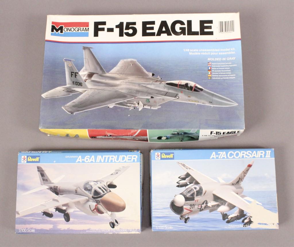 3 Airplane Model Kits - Monogram - Revell: Revell A-6A Intruder 1/100 scale, A-7A Corsair II 1/100 and Monogram F-15 Eagle 1/48 scale. The kit has been opened and is being sold in “as is” condition. Please check photos. [JLD 160]