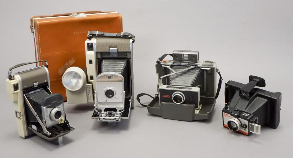 4 Vintage Polaroid Cameras: Untested 1950s Polaroid "The 800" Land Camera with Polaroid Wink-Light and Leather Case. Untested Polaroid Model 80. Working Polaroid Super Shooter "Plus." Working Polaroid 440. Cindy Sherman. Robert