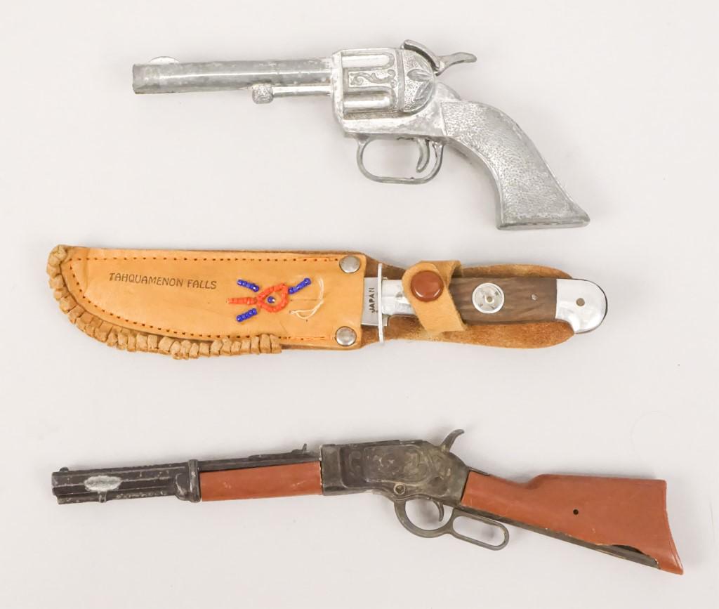 Vintage Toy Cap Guns & Knife with Compass: Pistol is cast aluminum, Shotgun is cast aluminum & plastic, knife has compass and Tahquamenon Falls sheath. Beadwork is damaged. Trigger pulls & snaps back but we have not test with caps. [RMP 4311]