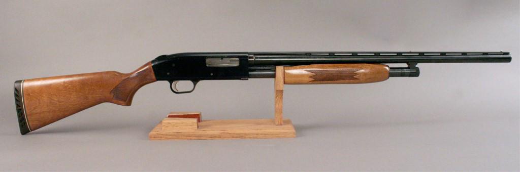 Mossberg 500C 20 Ga. Shotgun: Serial Number: K339532. Stand is not included, for photography purposes only. [DEB 211]