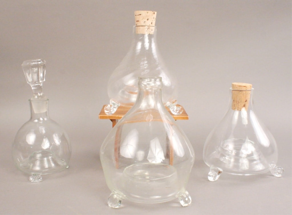 4 Clear Glass Tabletop Insect Traps: No makers marks. No visible chips or cracks. Stand is not included, for photography purposes only. [DEB 277]