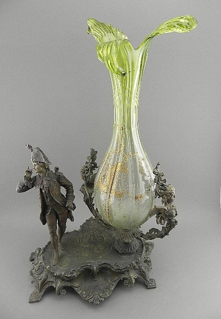 Victorian Art Glass & Figural Base Centerpiece: Very unusual object. We tend to think that some creative person created this centerpiece using 4 different pieces. There is the art glass vase, the bracket that is holding that, the gentleman and then