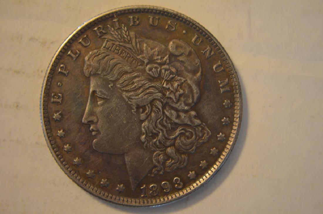 1893 S American Morgan silver coin. (1 of 4)