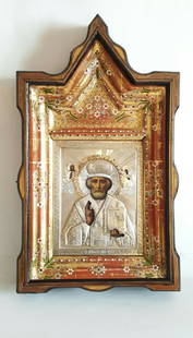 19C Russian Silver Icon St.Nicholas: 19C ANTIQUE RUSSIAN GILT SILVER OKLAD ICON OF ST.NICHOLAS THE WONDERWORKER. THE ICON CONTAINED IN A RARE CARVED WOOD KIOT WITH GILT WOOD FRAME ENAMEL PAINTED WITH FLOWERS AND BEADS .THE GILDED SILVER