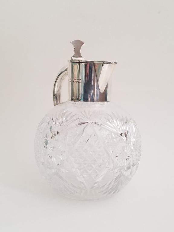 19C Russian Silver and Crystal Decanter Grachev Br: 19C Russian Silver and cut Crystal decanter . Engraved on the lid top HH and Barons Crown on top . Gilded interior. Hallmarked inside the lid and at the rim with Grachev Brothers , kokoshnik head , 84