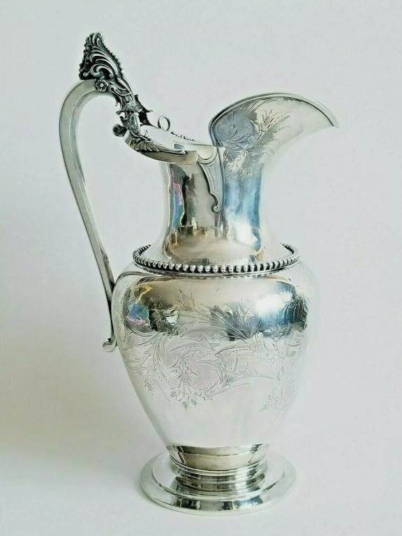 Lrg 19C Sterling Silver American Water Pitcher: Beautiful 19C Large Sterling Silver American Water Pitcher by George Sharp , Pennsylvania 1870 . Hallmarked on underside. Very heavy - Weight 45.5 toz ( 1416 gm ) . 15" ( 38 cm ) high , 9 1/2" ( 24 cm