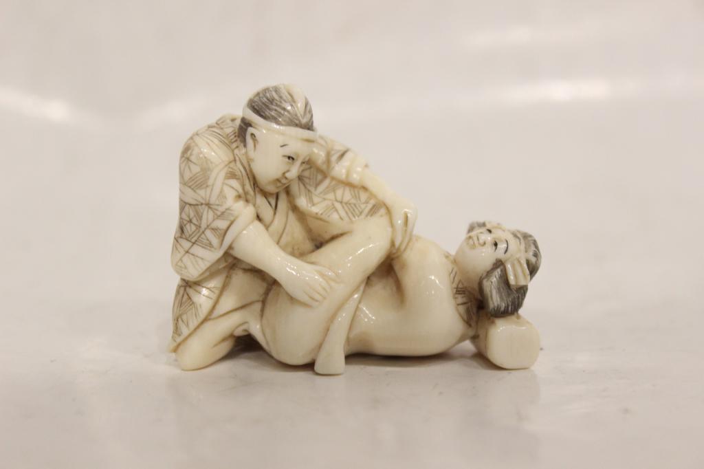 Japanese Bone Carved Erotic Netsuke Figurine Group: 1 3/4" W Please note the absence of a condition report does not imply that there are no condition issues with this lot. Please contact us for a detailed condition report.